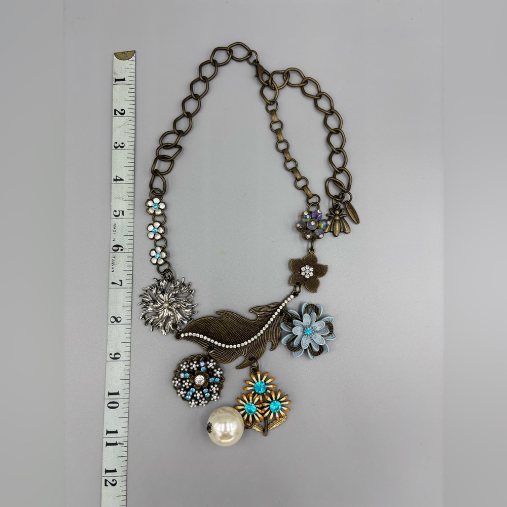 Plunder Floral Charm Necklace with Brass, Silver and Blue Accents
